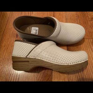 Dansko clogs. Never worn.